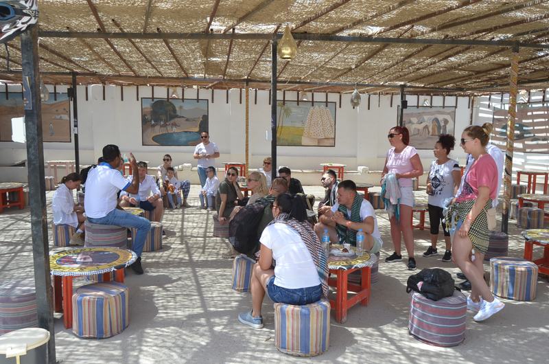 Tea break in the shade at the camp
